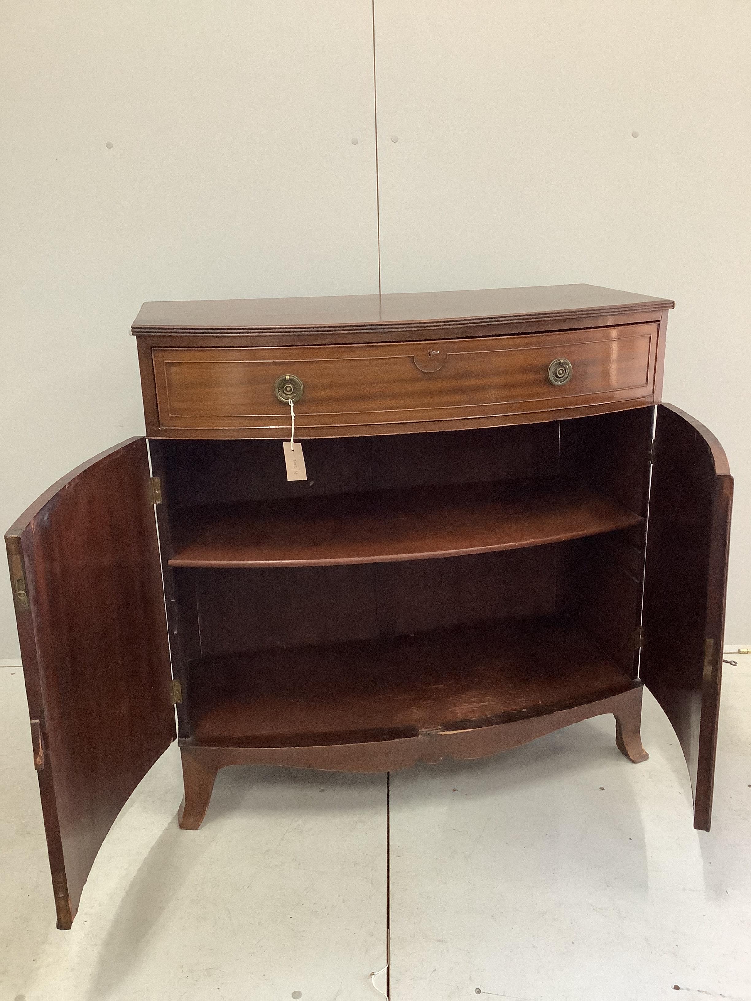 An Edwardian mahogany bowfront side cabinet, width 100cm, depth 49cm, height 100cm